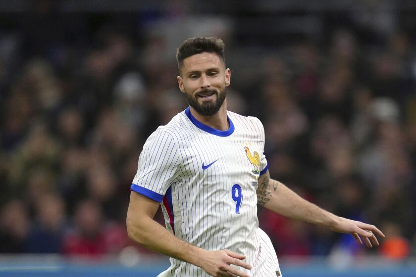France's Olivier Giroud during an international friendly soccer match between France and Chile at the Orange Velodrome stadium in Marseille, southern France, Tuesday, March 26, 2024. (AP Photo/Daniel Cole)