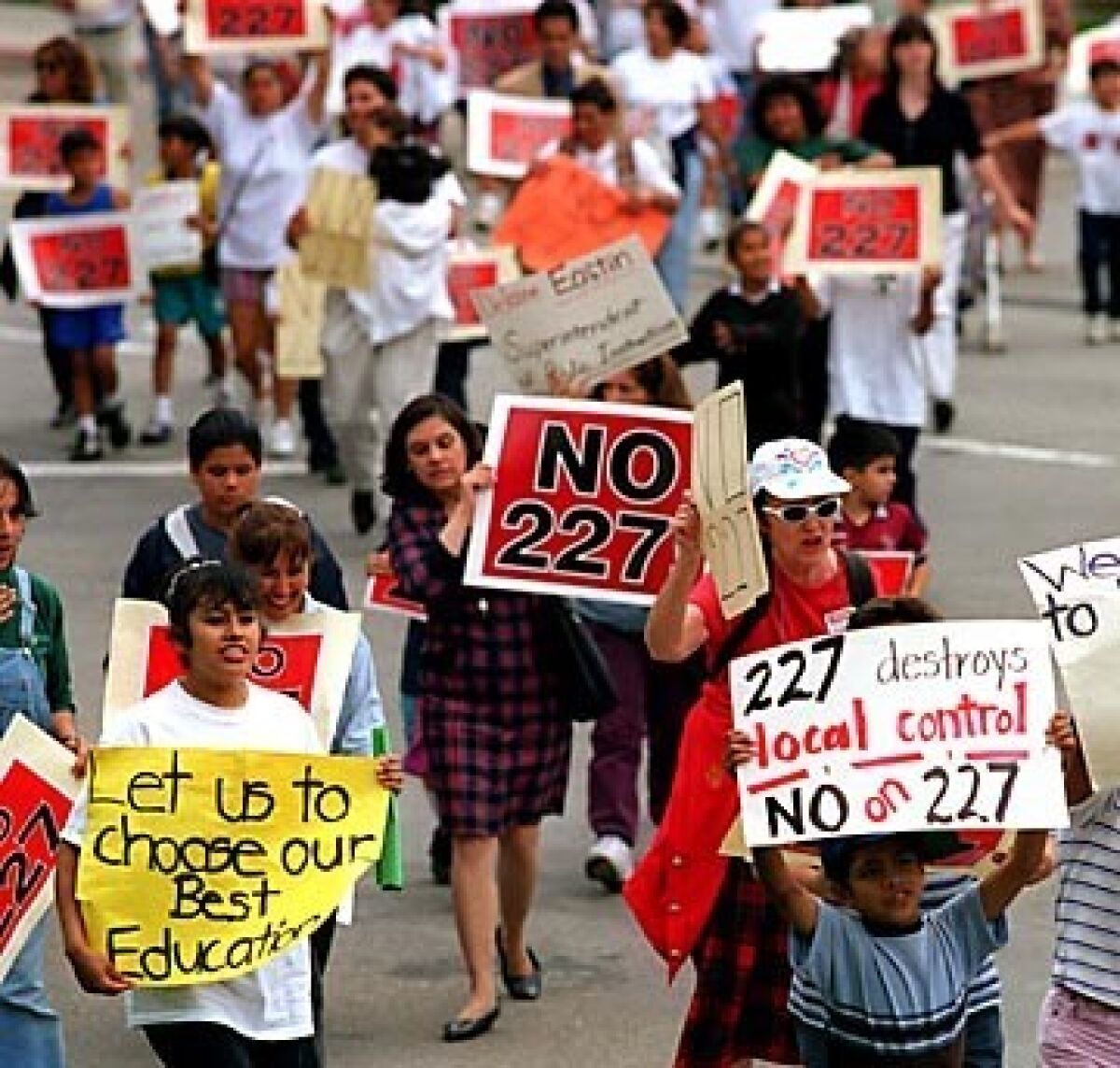 Students, parents and teachers opposed to Proposition 227 march toward a rally in Santa Ana in 1998.