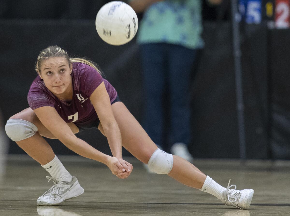 Laguna Beach's Cambria Hall digs a ball in the first round of the CIF State Southern California Regional Division I playoffs at Foothill on Tuesday.