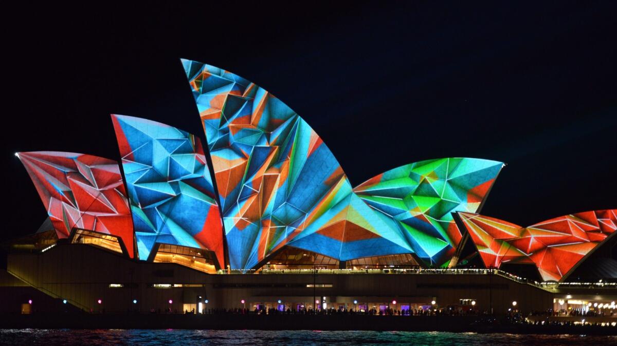 A light show called "Vivid" is performed on the Sydney Opera House in Sydney. "Vivid" is a major outdoor cultural event featuring light installations and projections.