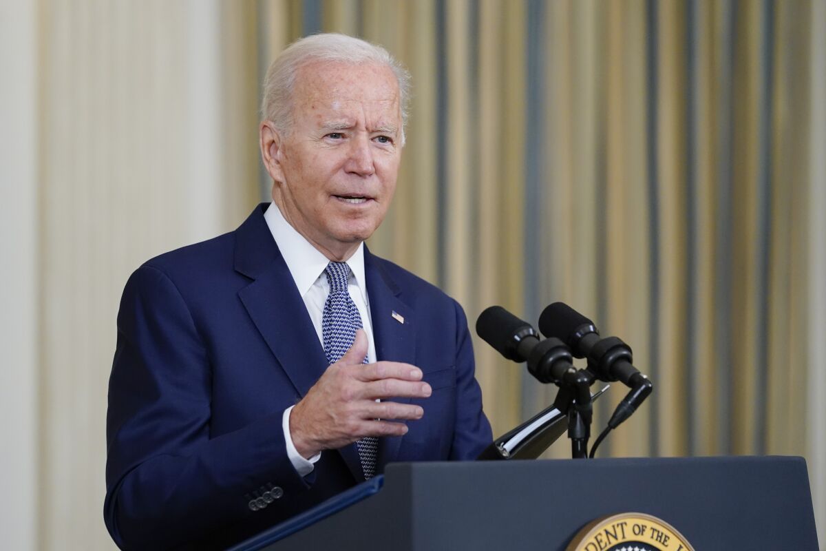 President Joe Biden speaks from the State Dining Room of the White House.