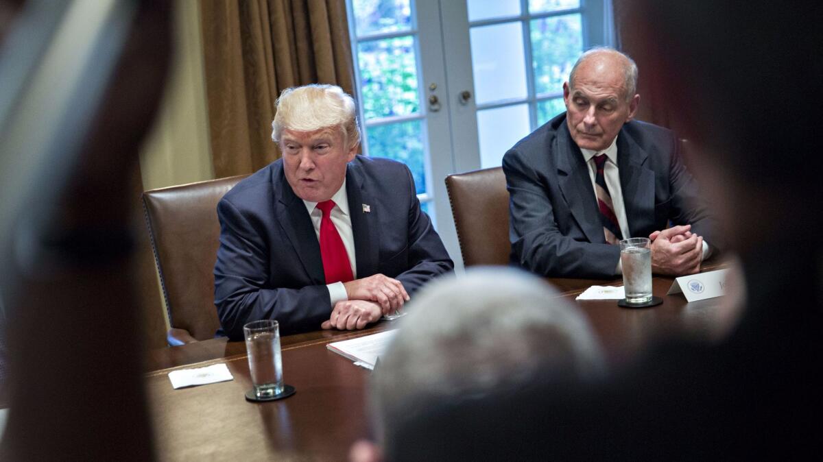 President Trump speaks as White House Chief of Staff John Kelly at a briefing with senior military leaders in the Cabinet Room of the White House this month.