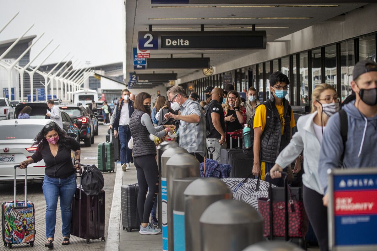 Passengers line up on Memorial Day weekend at Los Angeles International Airport. 