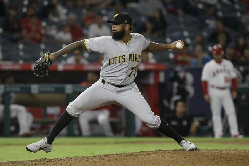 Pittsburgh Pirates relief pitcher Felipe Vazquez throws to a Los Angeles Angels batter during the ninth inning of a baseball game in Anaheim, Calif., Monday, Aug. 12, 2019. (AP Photo/Alex Gallardo)