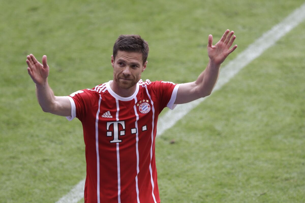 FILE - Bayern's Xabi Alonso waves to supporters as he leaves the field during the German first division Bundesliga soccer match between FC Bayern Munich and SC Freiburg at the Allianz Arena stadium in Munich, Germany, on May 20, 2017. Bayer Leverkusen has fired coach Gerardo Seoane and replaced with him with Xabi Alonso. The Bundesliga club said Wednesday Oct. 5, 2022 that it had “parted ways” with the Swiss coach and appointed the 40-year-old former Spain midfielder, who was to be given a contract through June 2024. (AP Photo/Matthias Schrader, File)