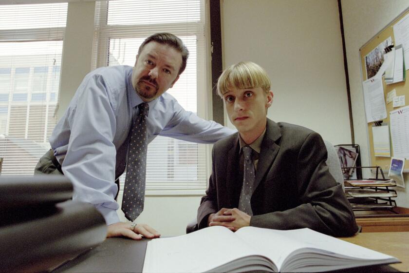 THE OFFICE SPECIAL – BBC AMERICA – OCT 21, 2004. PICTURED: David Brent (Ricky Gervais) and Gareth Keenan (MacKenzie Crook). WARNING: The photography may only be used for publicity purposes in connection with the broadcast of the programme as licensed by BBC Worldwide Ltd and must carry the shown copyright legend. It may not be used for any commercial purpose without a licence from the BBC. © BBC 2003