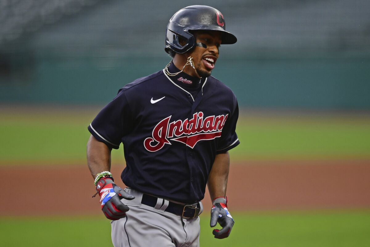 FILE - In this July 10, 2020, file photo, Cleveland Indians' Francisco Lindor runs the bases after hitting a home run during a simulated game at Progressive Field in Cleveland. The Indians are changing their name after 105 years, a person familiar with the decision told The Associated Press on Sunday, Dec. 13, 2020. After months of internal discussion prompted by public pressure and a national movement to remove racist names and symbols, the team is moving away from the name it has been called since 1915, said the person who spoke on condition of anonymity because the team has not revealed its plans. (AP Photo/David Dermer, File)