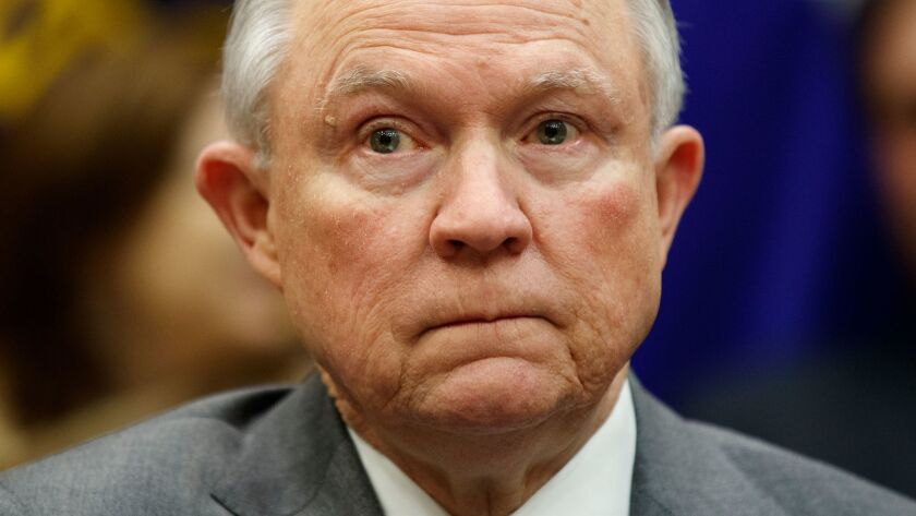 Atty. Gen. Jeff Sessions, seen here in February, spoke Wednesday in Sacramento about plans to sue the state of California over three parts of its “sanctuary state” law.