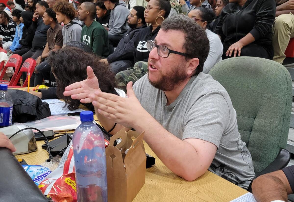 Stuart Koos has been operating the basketball scoreboard for 25 years at Westchester High.