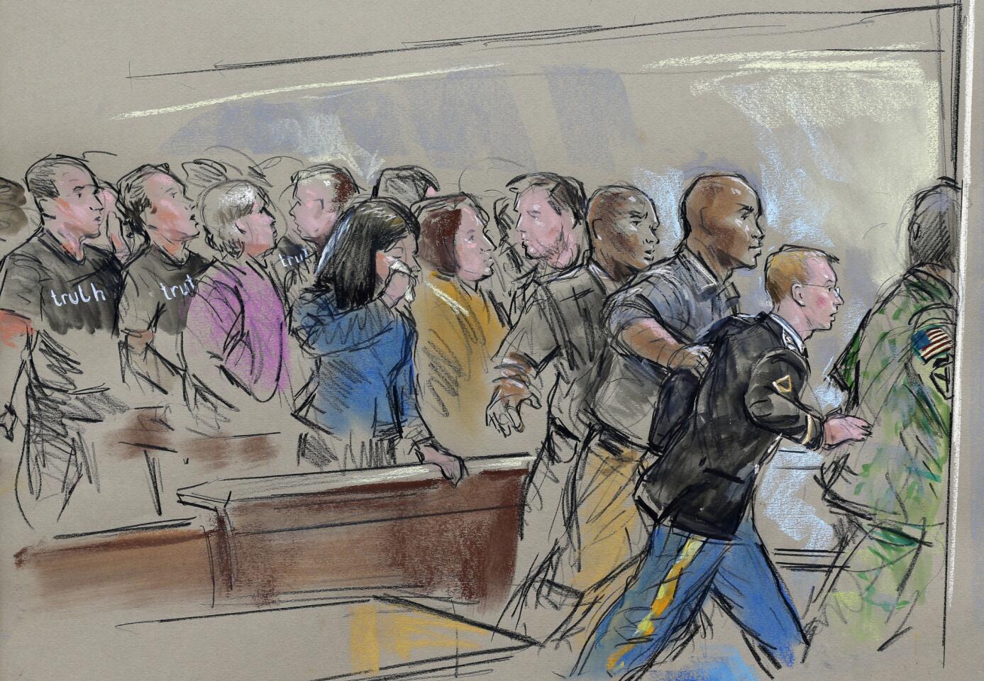 In this courtroom sketch, Army Pfc. Chelsea Manning is escorted out of a courtroom after receiving a sentence of 35 years in prison for leaking classified materials to WikiLeaks in a hearing in Ft. Meade, Md.