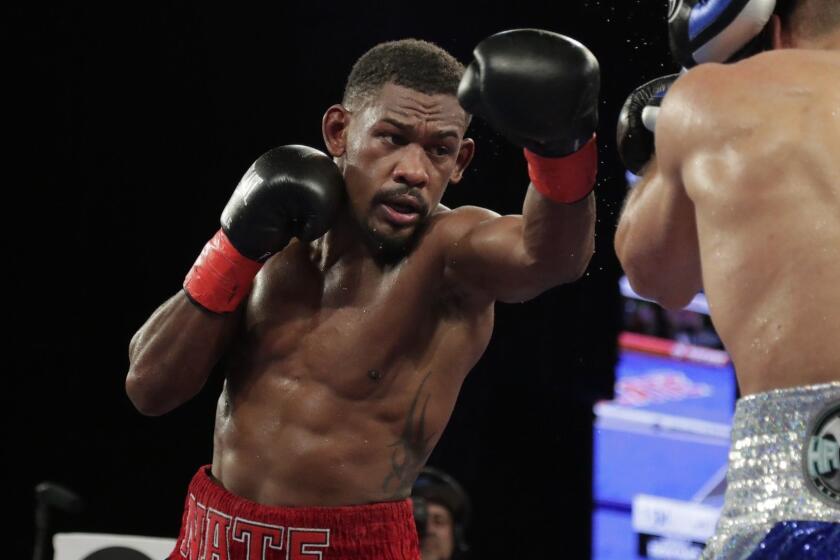 Daniel Jacobs, left, fights Ukraine's Sergiy Derevyanchenko during the sixth round of a IBF middleweight championship boxing match Saturday, Oct. 27, 2018, in New York. Jacobs won the fight. (AP Photo/Frank Franklin II)