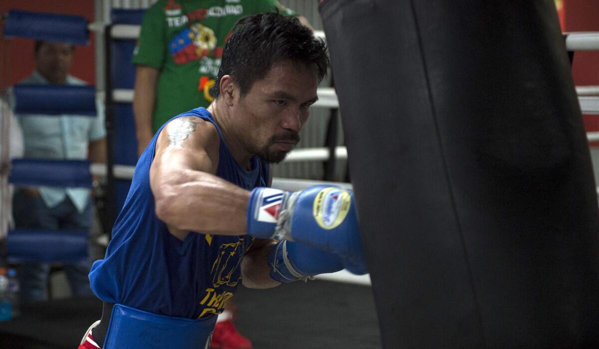 Manny Pacquiao trains at a gym in Manila, ahead of his Nov. 5 bout with Mexican boxer Jessie Vargas.