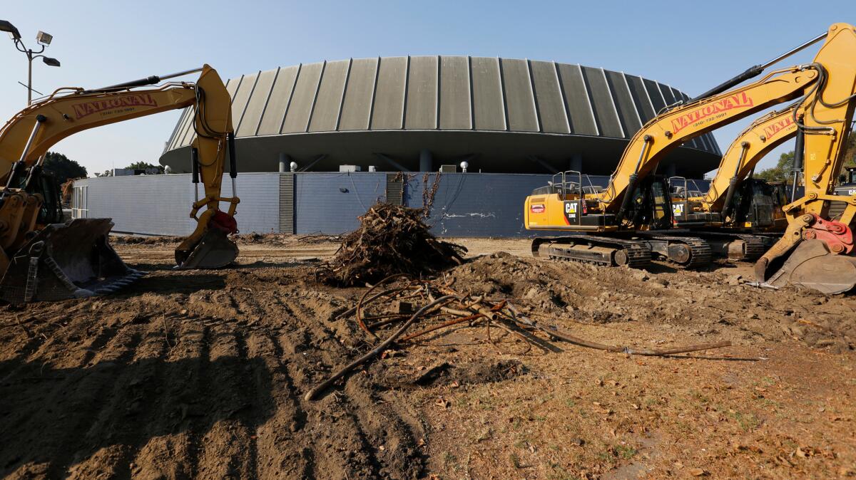 Excavating machinery on the grounds where the new stadium that will house the Los Angeles Football Club soccer team.