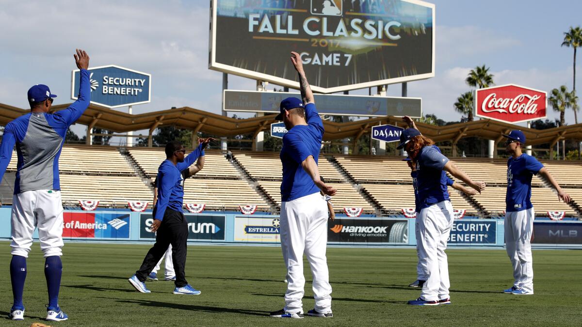 Dodgers warm up before Game 7 of of the World Series.