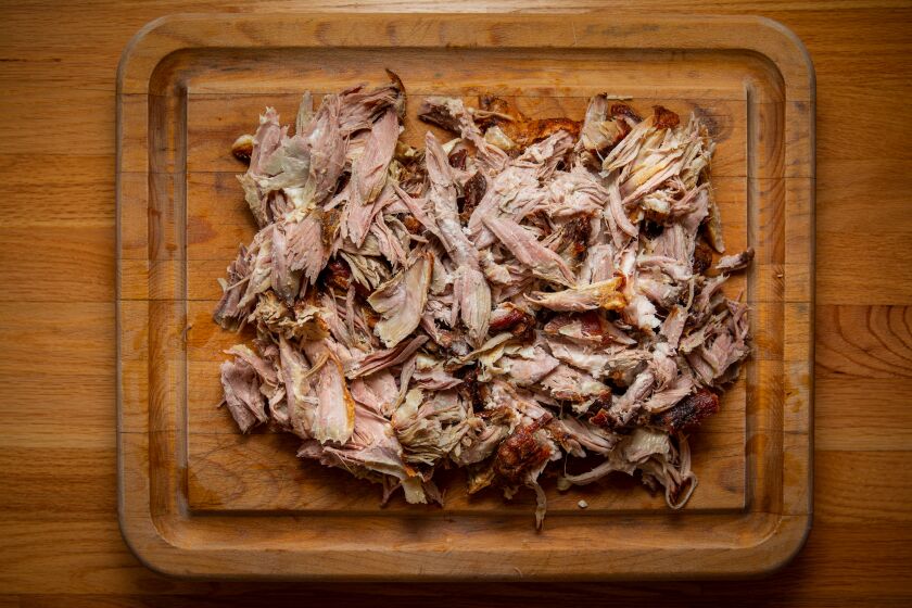 LOS ANGELES, CA - AUGUST 28: Fool-proof pulled pork, pulled by hand, but not before roasting the pork in the oven at high heat to brown/caramelize the outside, for 30-60 minutes, then reduce heat to 250 and cook until internal temp is 200 degrees, 10 to 14 hours, depending on size and weight of the cut, remove from oven, let rest until cool enough to touch with hands for serving, photographed at a Los Angeles, CA, home, Friday, Aug. 28, 2020. (Jay L. Clendenin / Los Angeles Times)