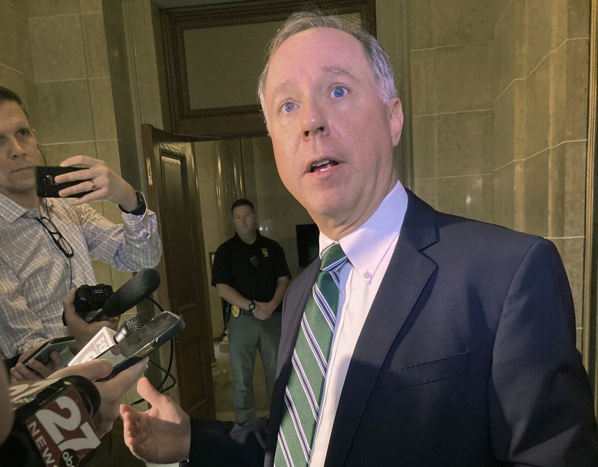 Wisconsin Republican Assembly Speaker Robin Vos tells reporters after a meeting with advocates for decertifying the 2020 election won by President Joe Biden, that his mind was not changed and that it is impossible to undo Biden's win on Wednesday, March 16, 2022, in Madison, Wis. (AP Photo Scott Bauer)