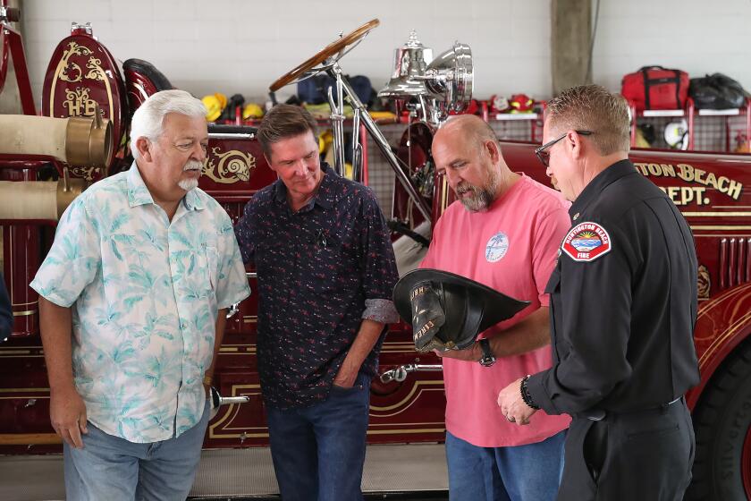 Terry Hibler, Dave Hibler, Mayor Pro-Tem Pat Burns, and fire chief Scott Haberly.