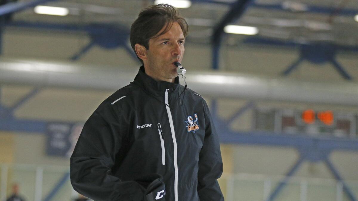 Dallas Eakins watches the San Diego Gulls during practice in San Diego in 2015. His tenure with the Ducks kicks off Thursday against the Arizona Coyotes.