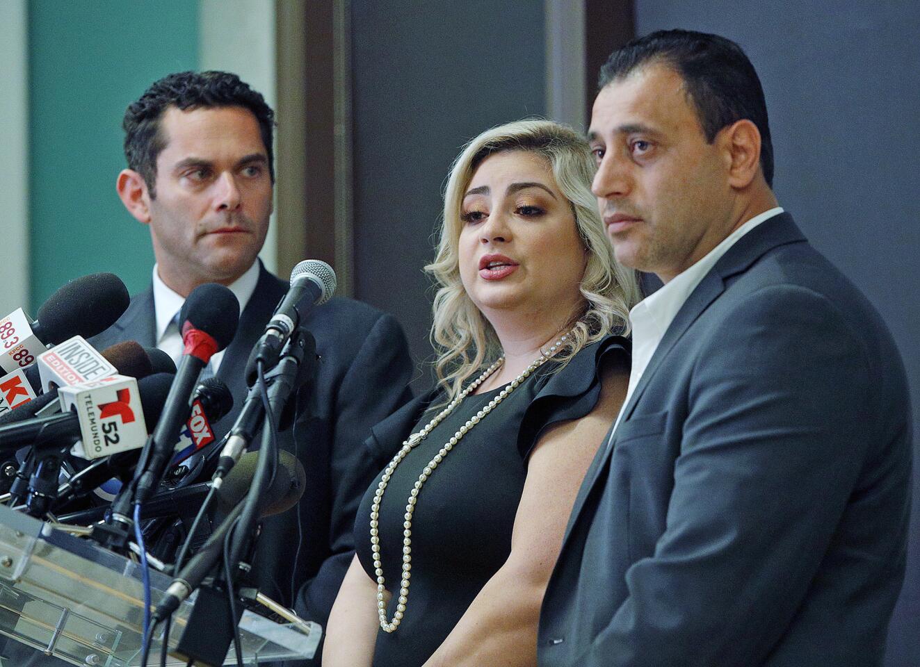 Anni and Ashot Manukyan, with attorney Adam Wolf, speak about their ordeal at a press conference to talk about the Manukyan's claim of negligence against the Los Angeles-based CHA Fertility Center at La Plaza de Cultura y Artes in Los Angeles on Wednesday. The Glendale couple is suing CHA Health Systems and CHA Fertility Center for negligence in the handling of their genetic samples in an effort to have a baby. Their sample was used for a couple in New York to conceive a baby while the Manukyan's were given a sperm/egg sample from yet a different couple, a case involving three different couples.