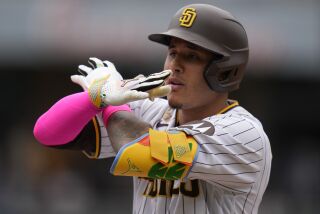 San Diego Padres' Manny Machado reacts after hitting a single during the fourth inning of a baseball game against the Seattle Mariners, Wednesday, June 7, 2023, in San Diego. (AP Photo/Gregory Bull)