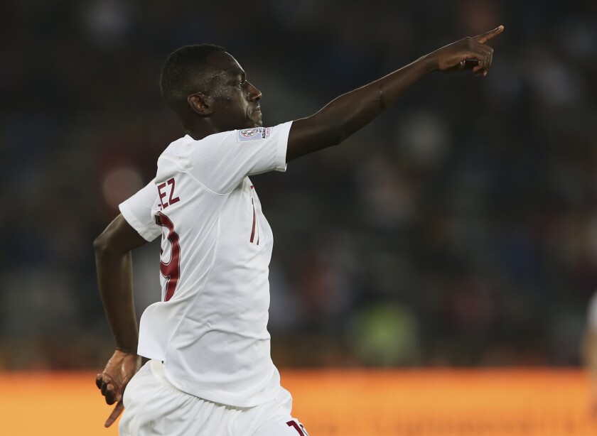 Almoez Ali celebrates after scoring
