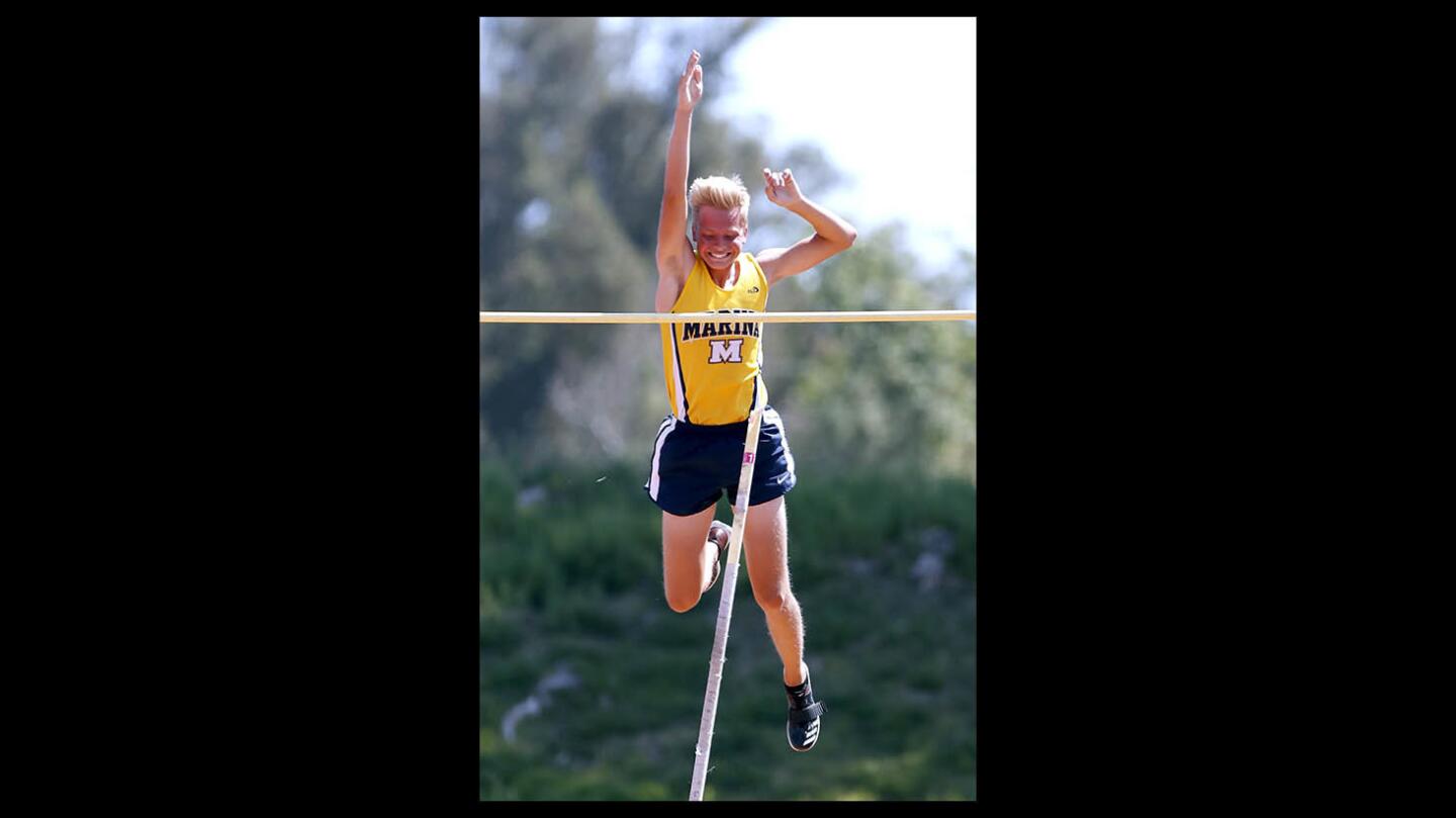 Marina High's Skyler Magula wins the pole vault event and grabs a personal record by clearing the bar at 15 feet, 8 inches at the Orange County Championships at Mission Viejo High on Saturday, April 14, 2018.
