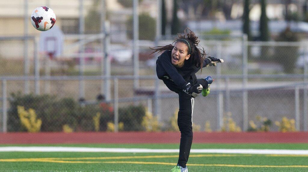Fountain Valley High goalie Kiana Flores passes the ball to a teammate during the second half against Ocean View.