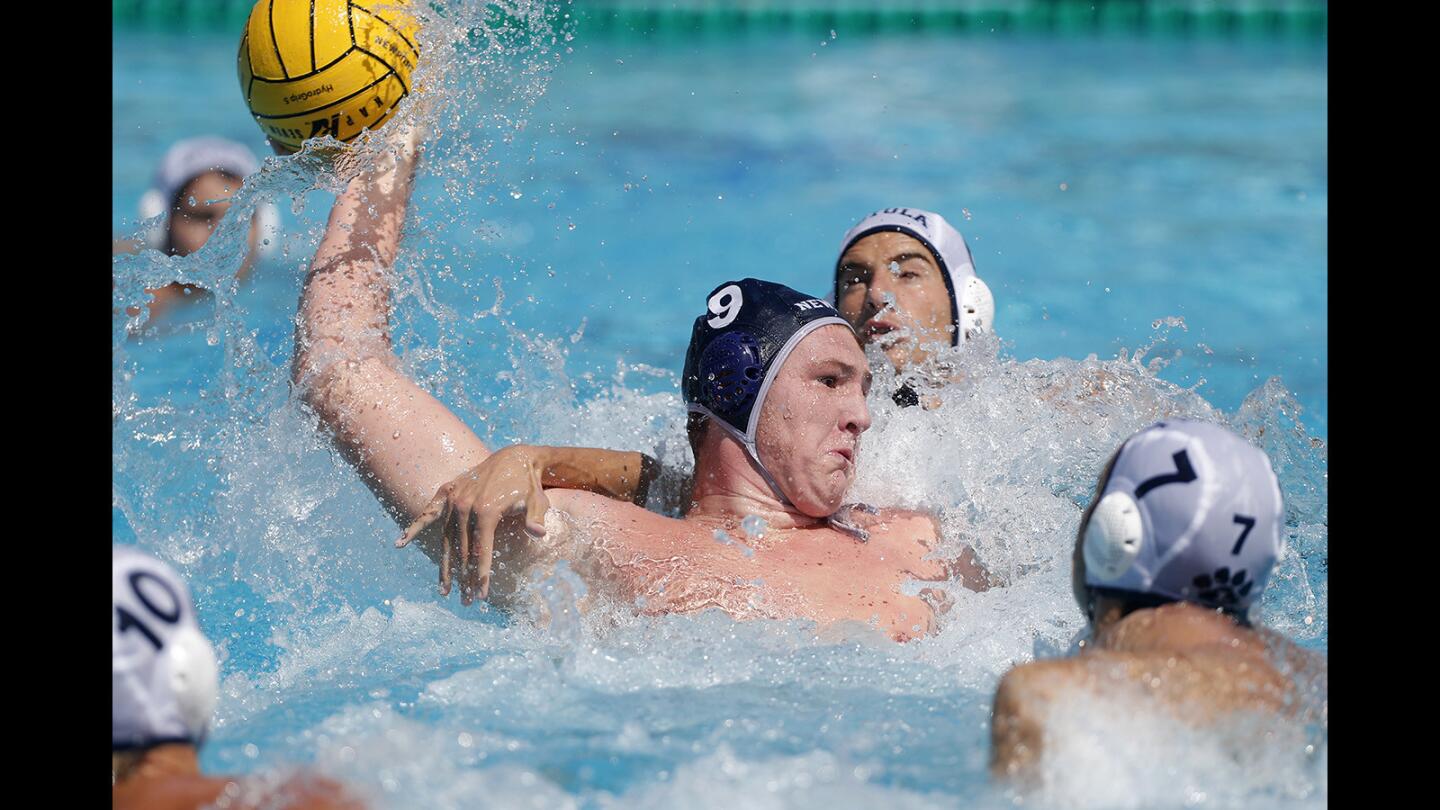 Newport Harbor High's Ike Love (9) scores against Loyola during the first half in the South Coast Tournament semifinals at Newport Harbor High on Saturday, Sept. 22.