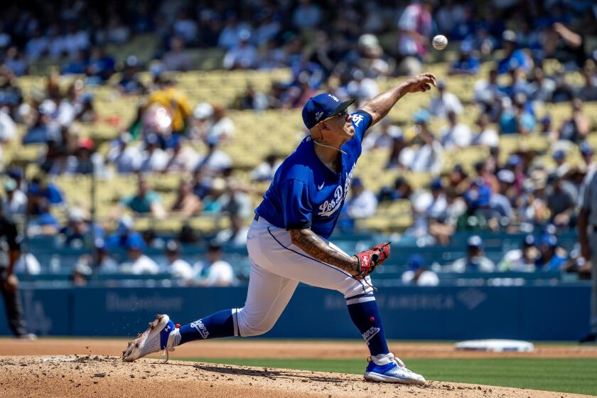 Dodgers pitcher Julio Urias works against the Colorado Rockies on Aug, 13, 2023, at Dodger Stadium.