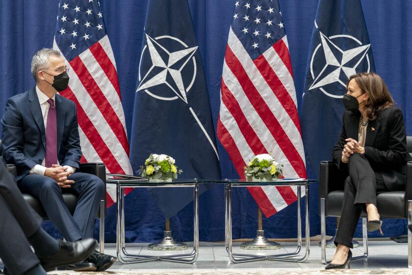 Vice President Kamala Harris meets with NATO Secretary General Jens Stoltenberg, left, during the Munich Security Conference, Friday, Feb. 18, 2022, in Munich. (AP Photo/Andrew Harnik, Pool)