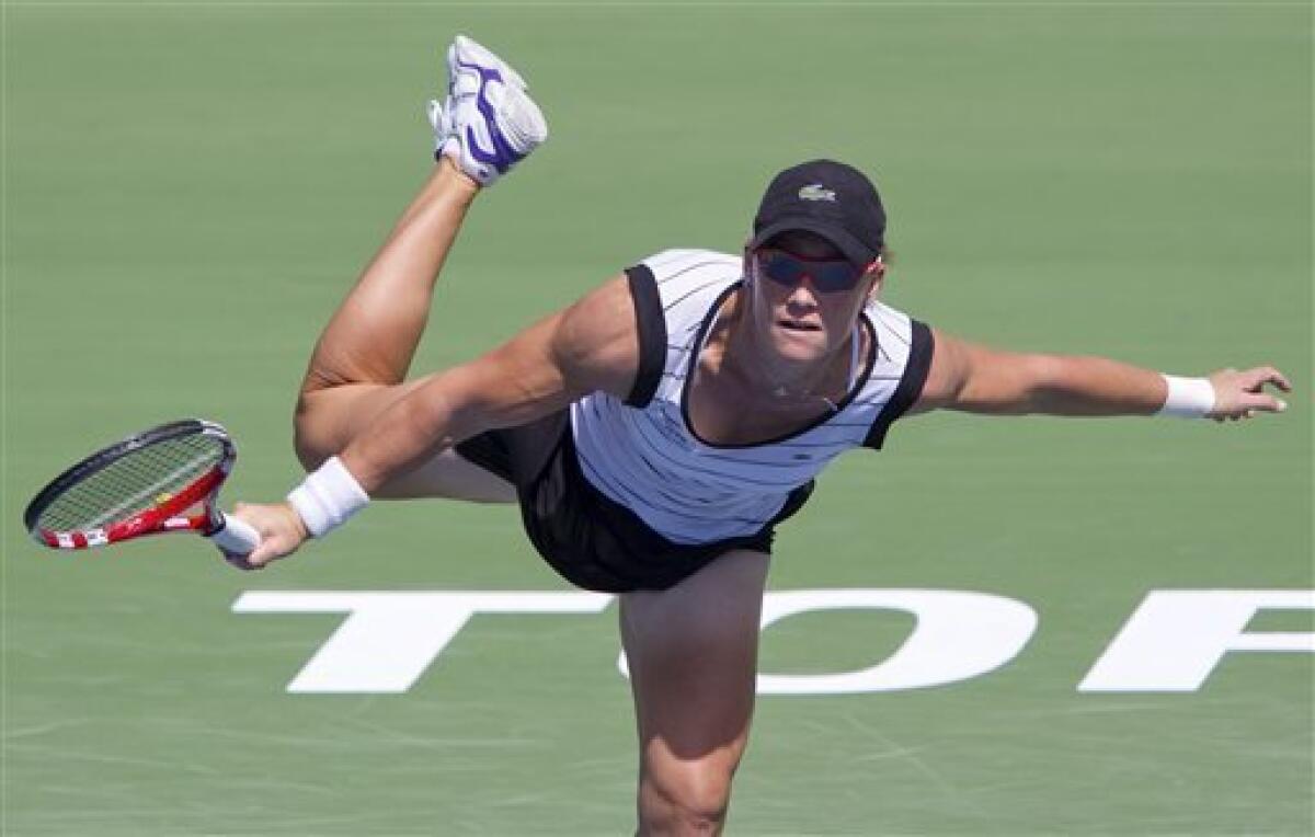 Samantha Stosur, of Australia, serves during her match against Li Na, of China, at the Rogers Cup women's tennis tournament in Toronto Thursday, Aug. 11, 2011. (AP Photo/The Canadian Press, Darren Calabrese)