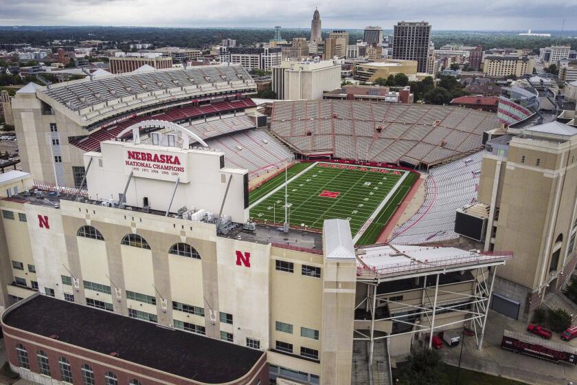 FILE - Memorial Stadium in Lincoln, Neb., where the Nebraska team plays NCAA college football, is seen in an undated image. The proposed massive renovation of Memorial Stadium has been downsized for the time being, meaning the south end of the stadium won't be torn down after the 2024 season as originally planned, new athletic director Troy Dannen said in a statement Friday, May 17, 2024. (Chris Machian/Omaha World-Herald via AP, File)