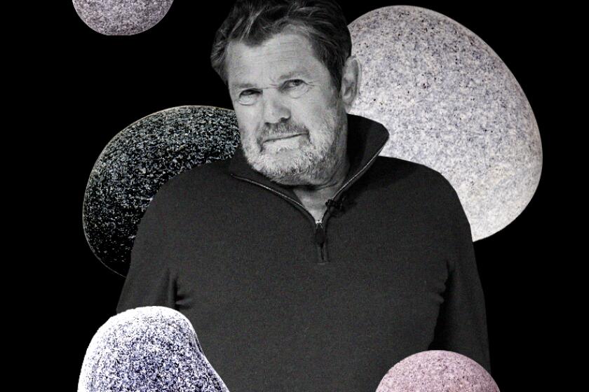 Jann Wenner among stones 