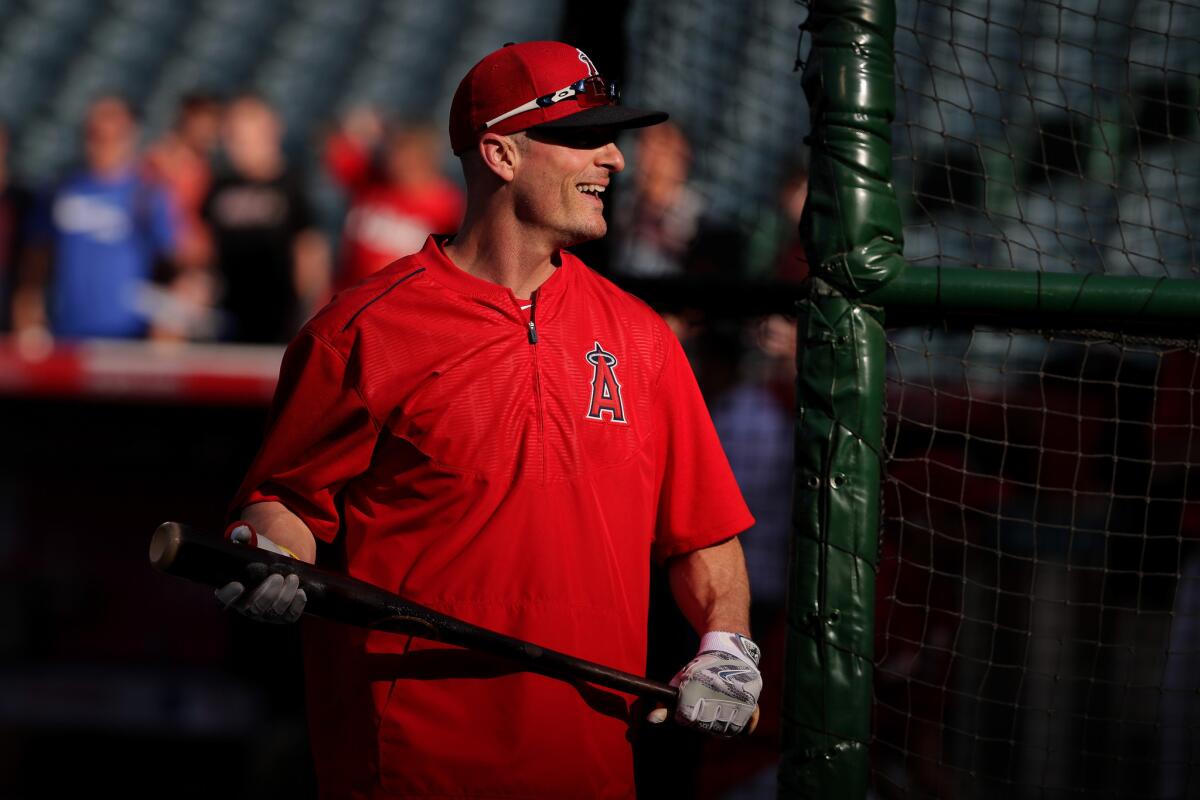 Brendan Ryan laughs during batting practice before a game against the Cardinals on May 12.