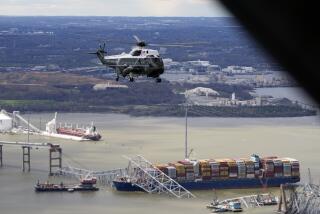 President Joe Biden, aboard Marine One, takes an aerial tour of the collapsed Francis Scott Key Bridge in Baltimore, Friday, April 5, 2024, as seen from an accompanying aircraft. (AP Photo/Manuel Balce Ceneta)