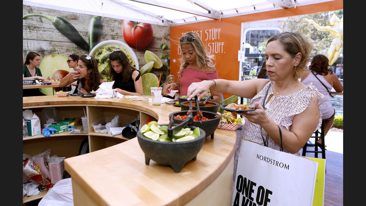 Photo Gallery: Wholly Guacamole's Guac Stop pop up restaurant gives out free samples of guacamole at Americana at Brand