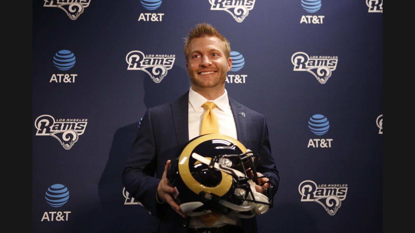 Sean McVay, the youngest coach in NFL history at age 30, holds a Rams helmet after being introduced as the team's coach during a news conference at their headquarters in Thousand Oaks on January 13, 2017.