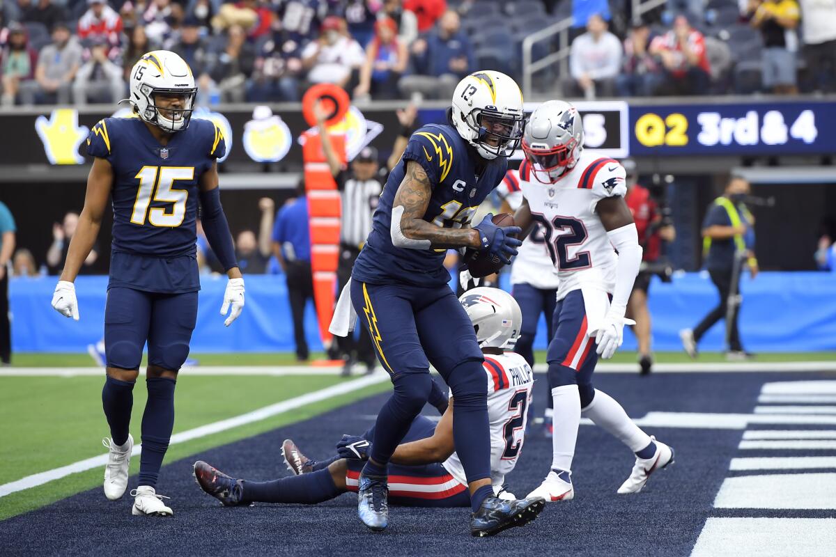 Chargers wide receiver Keenan Allen celebrates after making a touchdown catch.