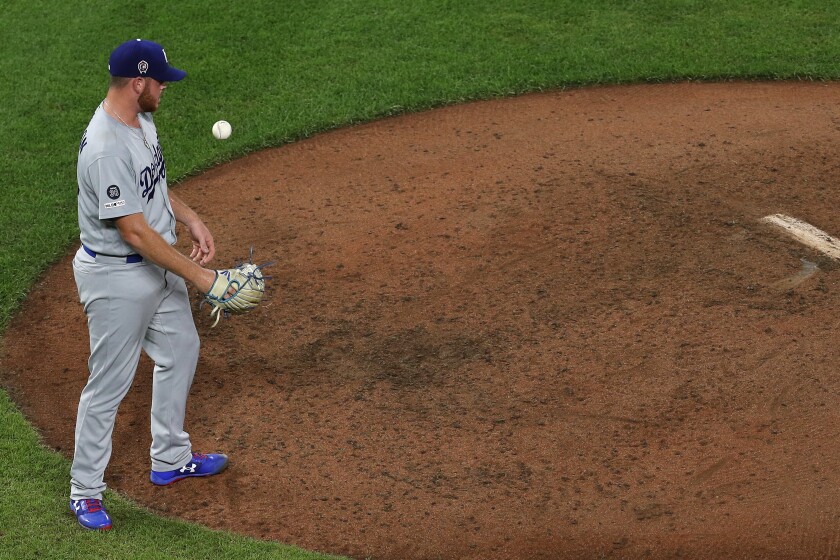 Dodgers reliever Caleb Ferguson reacts after allowing a three-run home run to Baltimore's Jonathan Villar during the seventh inning of the Dodgers' 7-3 loss Wednesday.