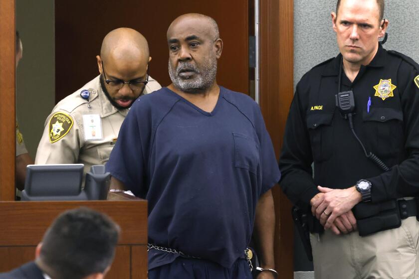 Duane "Keffe D" Davis is led into the courtroom at the Regional Justice Center on Wednesday, Oct. 4, 2023, in Las Vegas. Davis has been charged in the 1996 fatal drive-by shooting of rapper Tupac Shakur. (Bizuayehu Tesfaye/Las Vegas Review-Journal via AP, Pool)