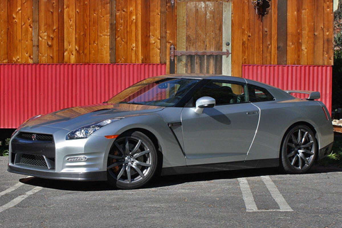 The 2013 Nissan GT-R gets 545 horsepower and 463 pound-feet of torque coming from a twin-turbocharged, 3.8-liter V-6 engine. Sticker price on the model seen here is $100,820.