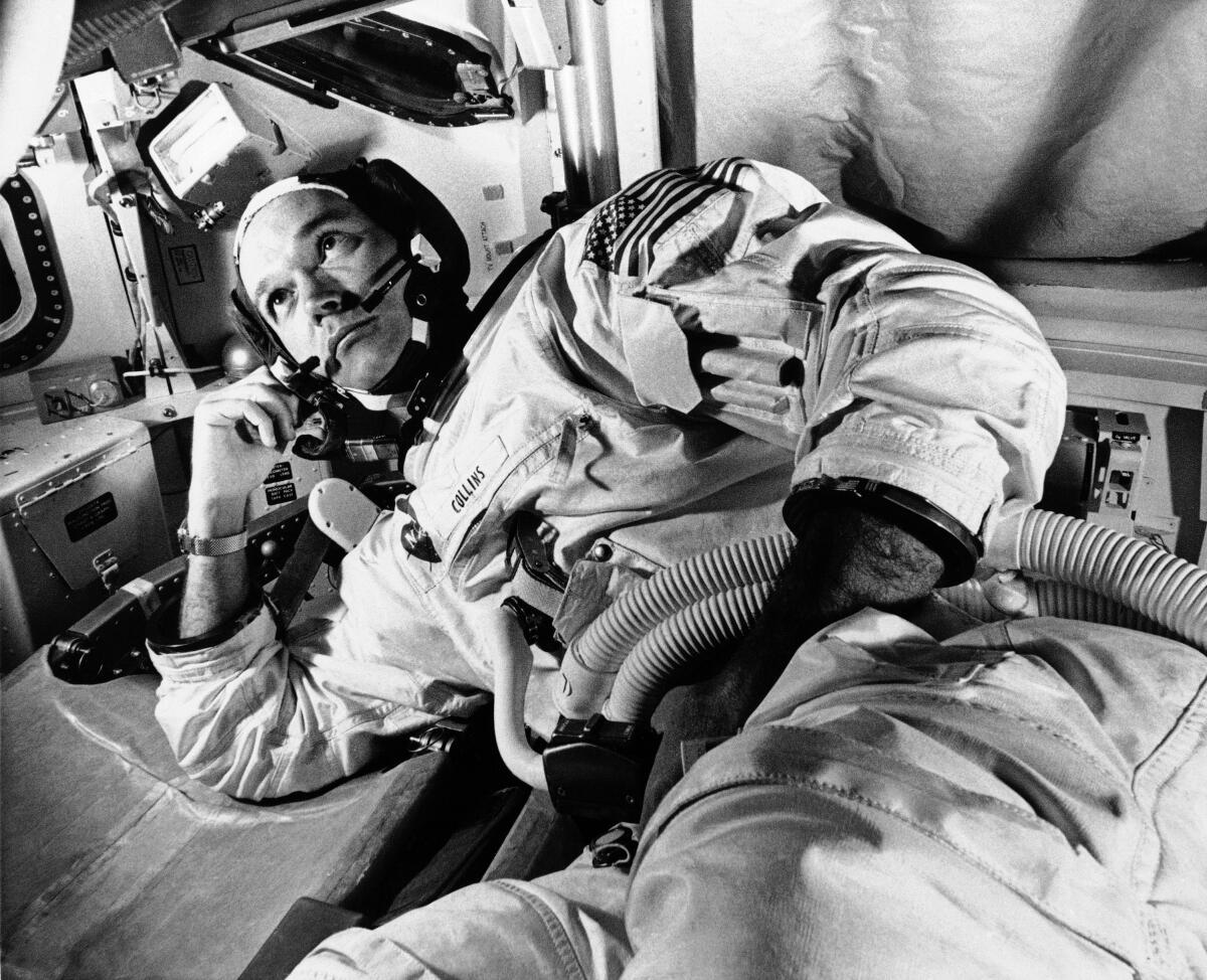 Michael Collins in a spacesuit