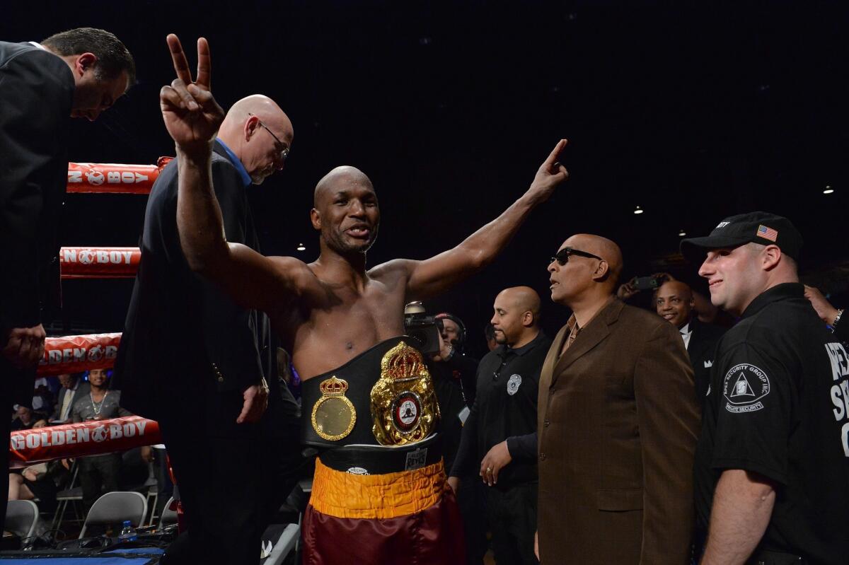 Bernard Hopkins celebrates after his victory over Beibut Shumenov on Saturday for the WBA and IBA light-heavyweight titles.