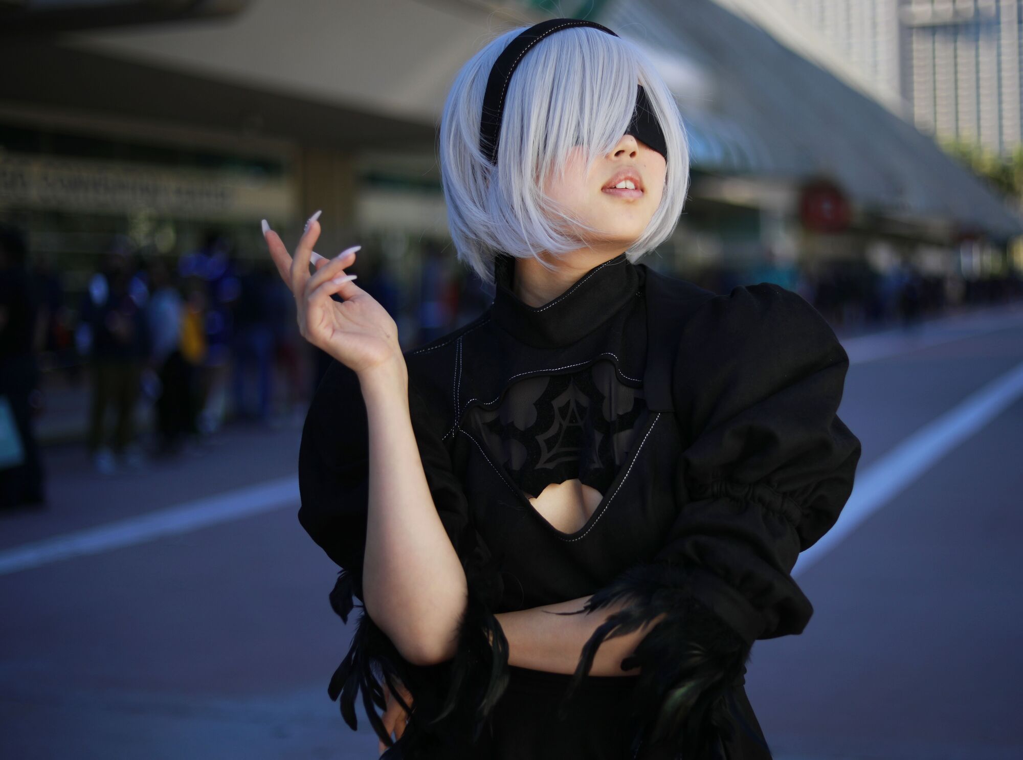 Mona You of San Mateo dressed as 2B from the video game NieR:Automata at Comic-Con Special Edition.