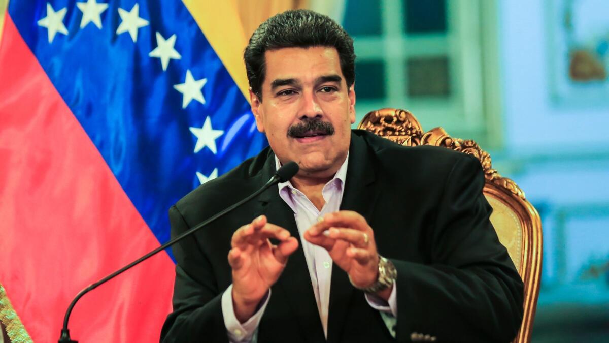 Maduro talks during a meeting with Venezuelan diplomats returning from the U.S. on Monday.