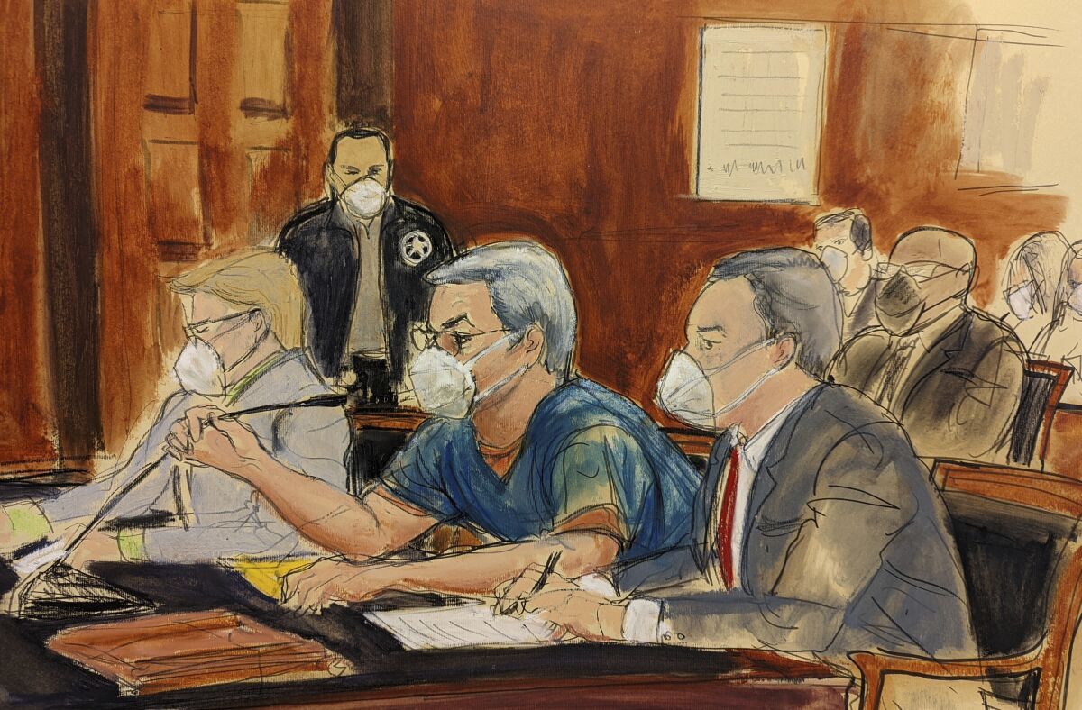 In this courtroom sketch, Juan Orlando Hernández, center, speaks into a microphone while pleading not guilty to drug trafficking and weapons charges flanked by his lead defense attorney Raymond Colon, right, Tuesday, May 10, 2022, in New York. The former Honduran president pleaded not guilty to charges that he received millions of dollars from 2004 to 2022 to support a drug trade that delivered hundreds of thousands of kilos of drugs to the U.S. (AP Photo/Elizabeth Williams)