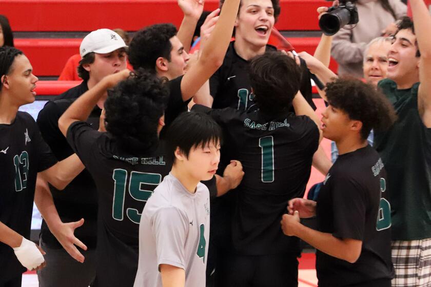 Sage Hill's volleyball team celebrate after winning against Fullerton High School boys' volleyball team in the CIF Southern Section Division 5 boys' volleyball playoffs at Fullerton High School in Fullerton on Thursday, April 25, 2024. (Photo by James Carbone)