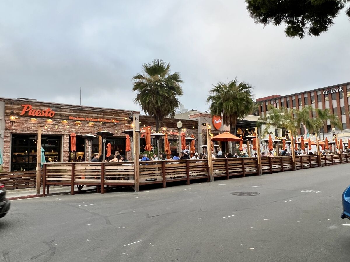 Businesses that use public property for outdoor dining must apply for a permit under San Diego's "Spaces as Places" program.
