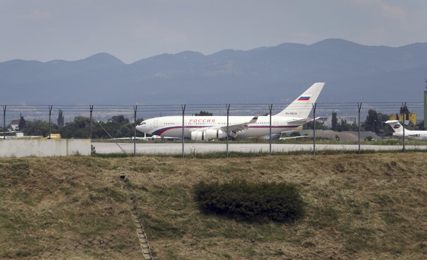 A Russian plane lands at Sofia's Airport, Sunday, July 3 2022. Two Russian airplanes were set to depart Bulgaria on Sunday with scores of Russian diplomatic staff and their families amid a mass expulsion that has sent tensions soaring between the historically close nations, a Russian diplomat said. (AP Photo/Valentina Petrova)