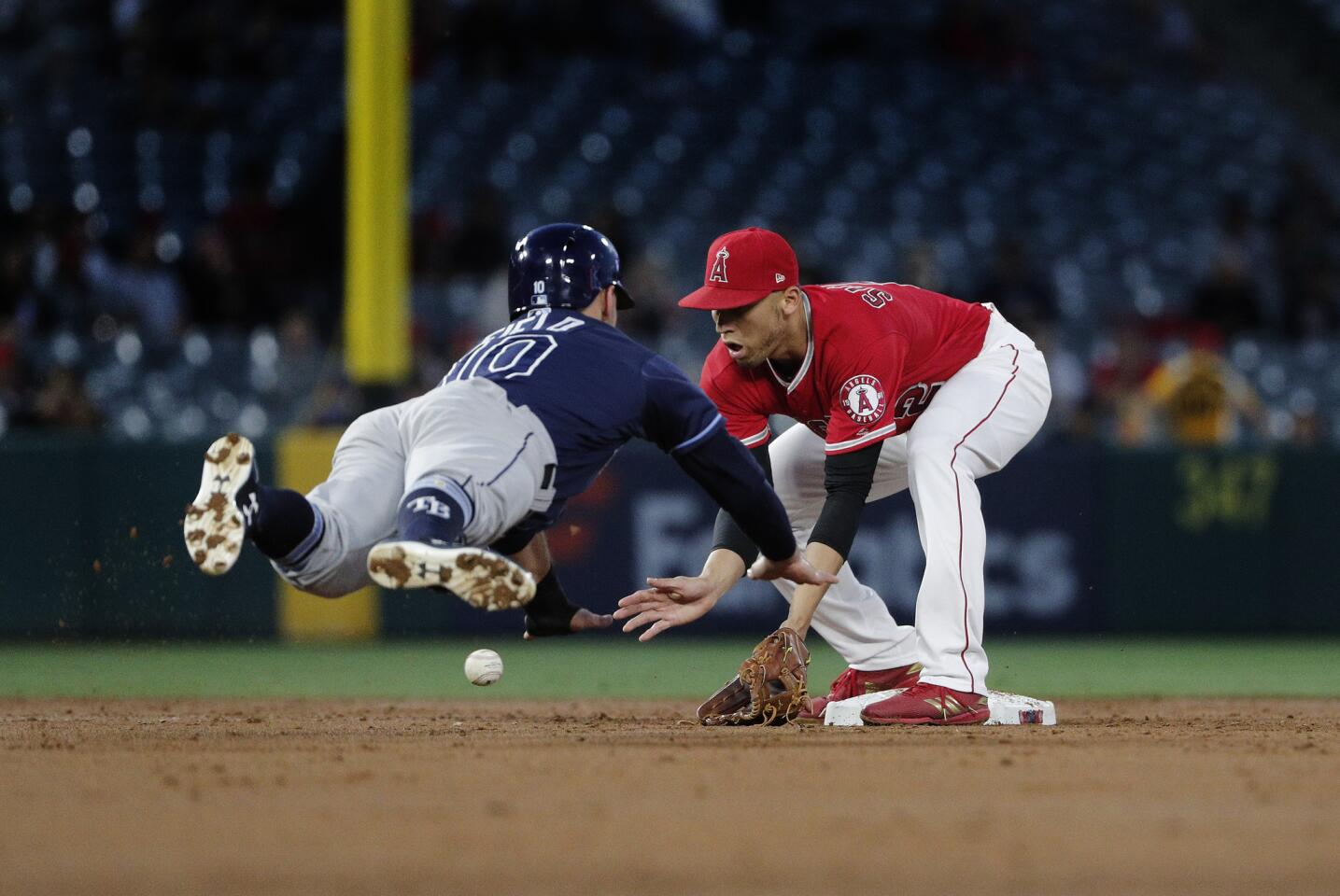 Angels shortstop Andrelton Simmons (2) fields a grounder before tagging out Tampa Bay Rays center fielder Johnny Field (10) during a double play in the third inning on May 17.